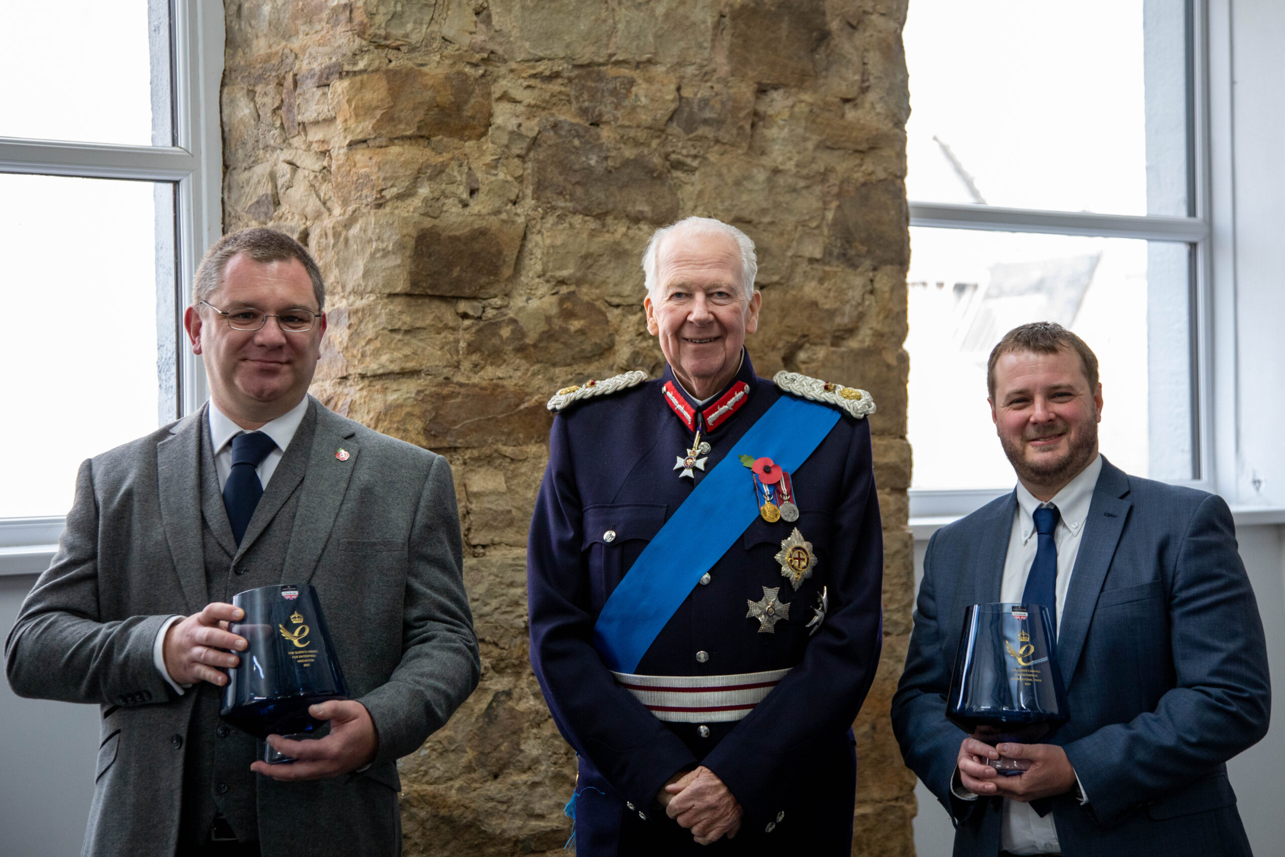 Dr. Craig Stracey and Dr. Rob Paramore from Pi receiving the Queen's Awards from the Lord-Lieutenant of Lancashire