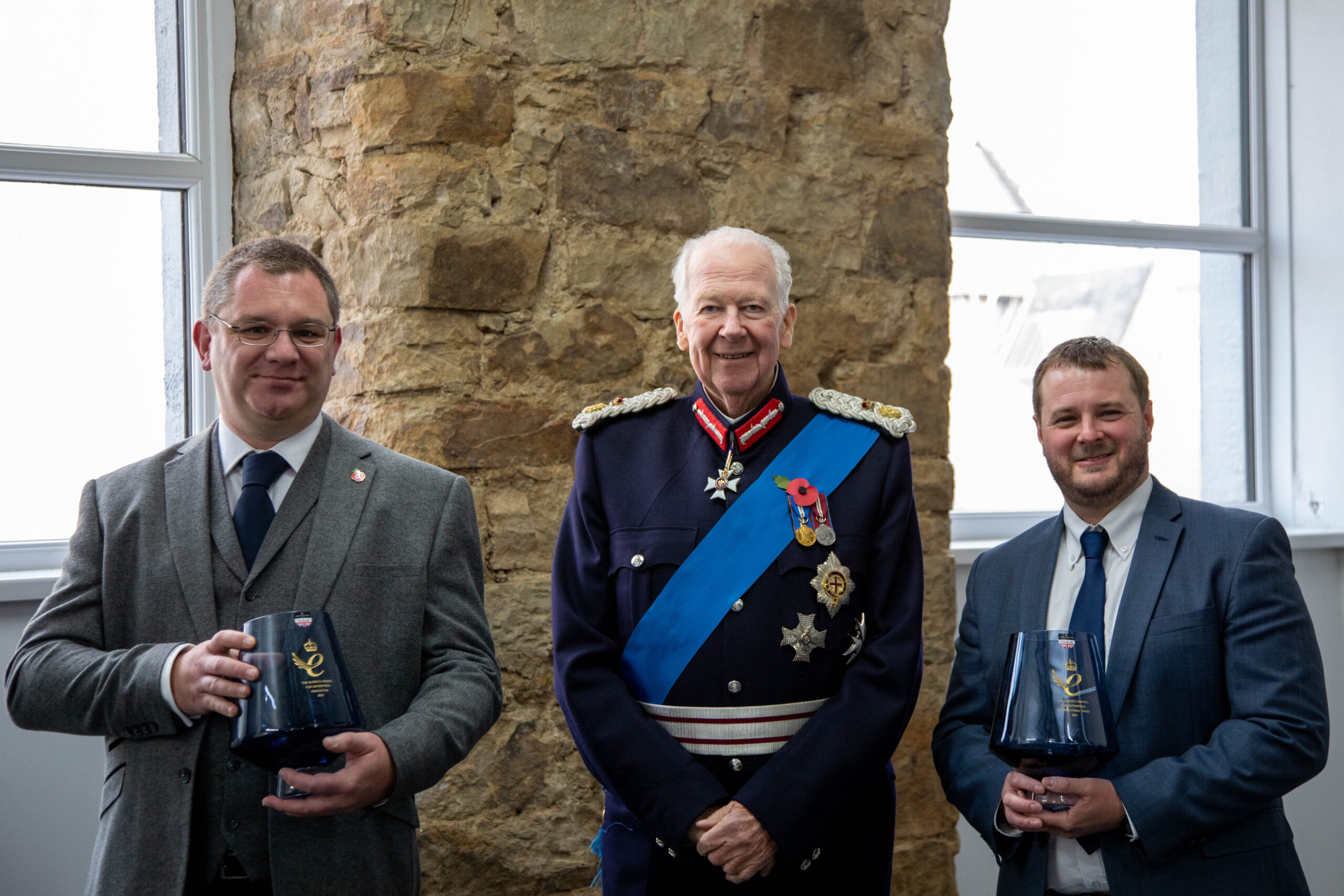 Dr. Craig Stracey and Dr. Rob Paramore from Pi receiving the Queen's Awards from the Lord-Lieutenant of Lancashire